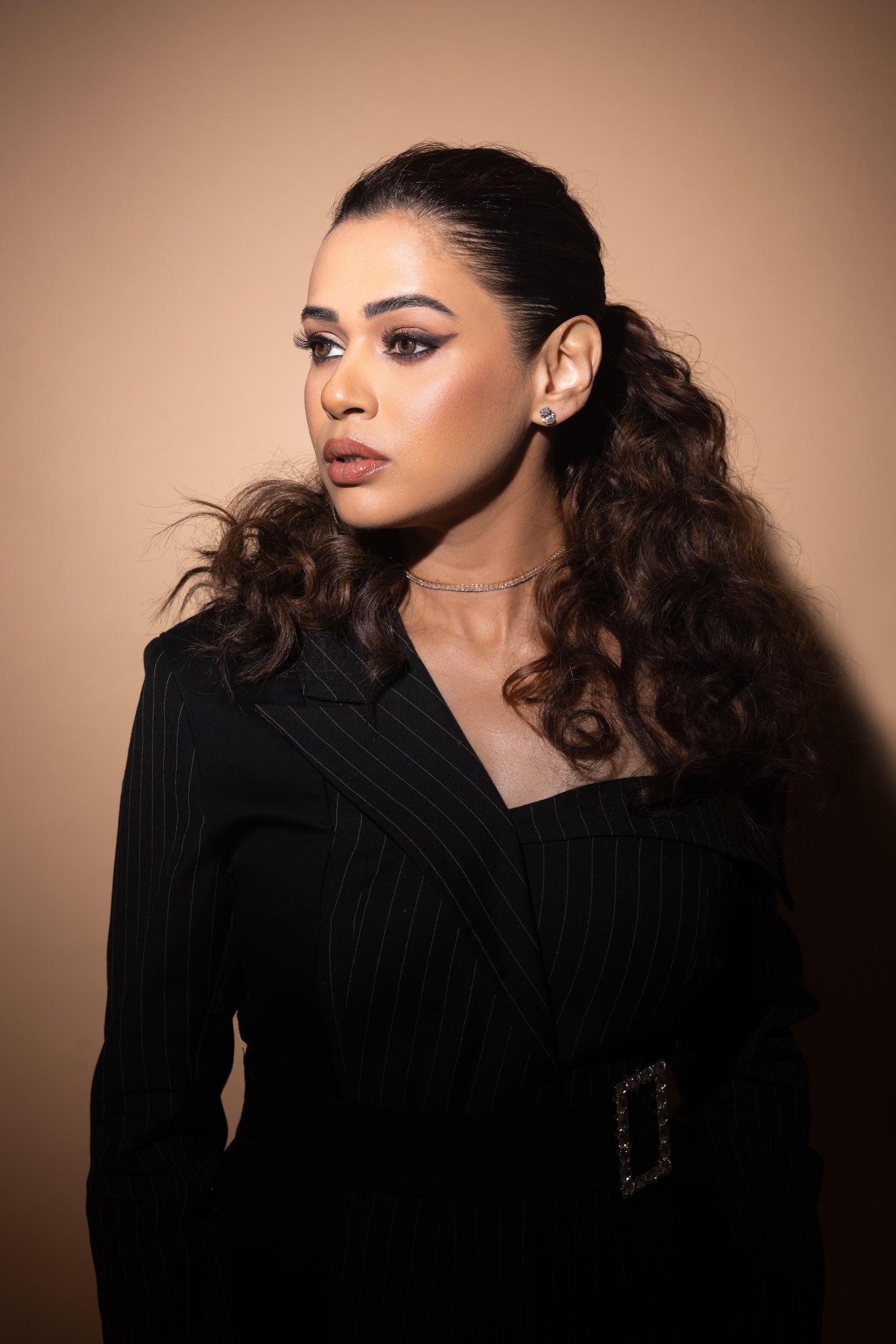 Shalmali Kholgade in Double Breasted Off Shoulder Suit Ensemble in Midnight Noir with pinstripes