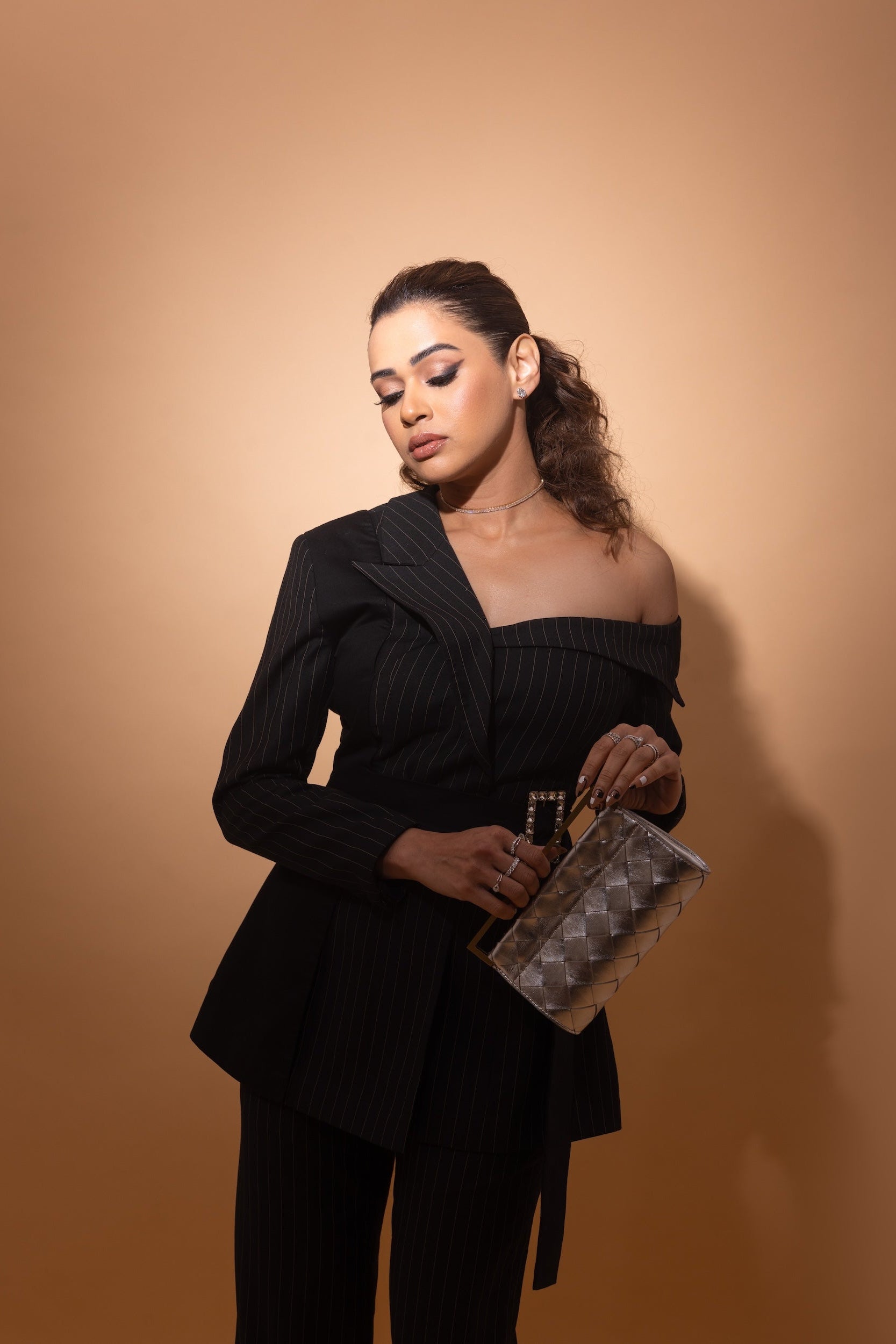 Shalmali Kholgade in Double Breasted Off Shoulder Suit Ensemble in Midnight Noir with pinstripes