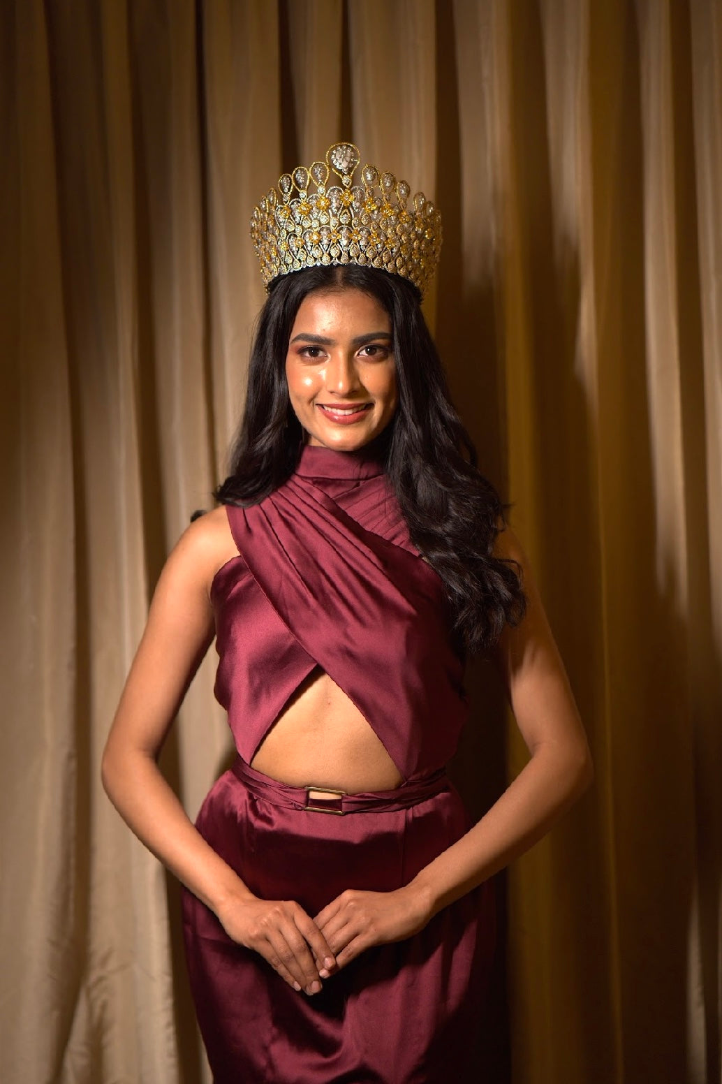 Nikita Porwal in Dione Gown in Deep Rosewood