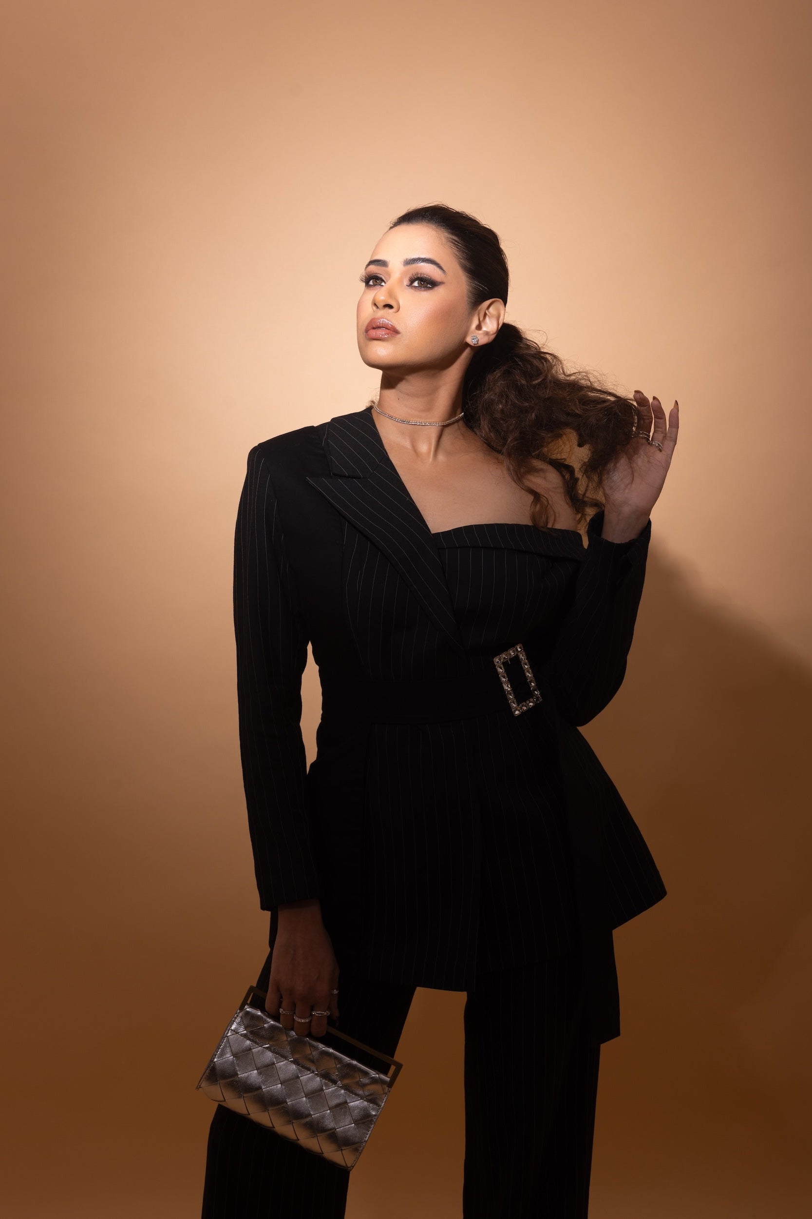 Shalmali Kholgade in Double Breasted Off Shoulder Suit Ensemble in Midnight Noir with pinstripes